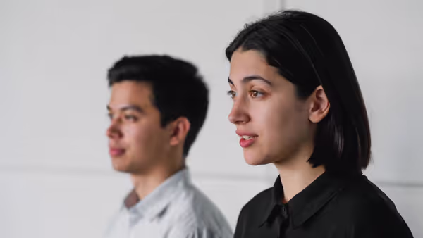 Partner setting a boundary calmly while the other listens
